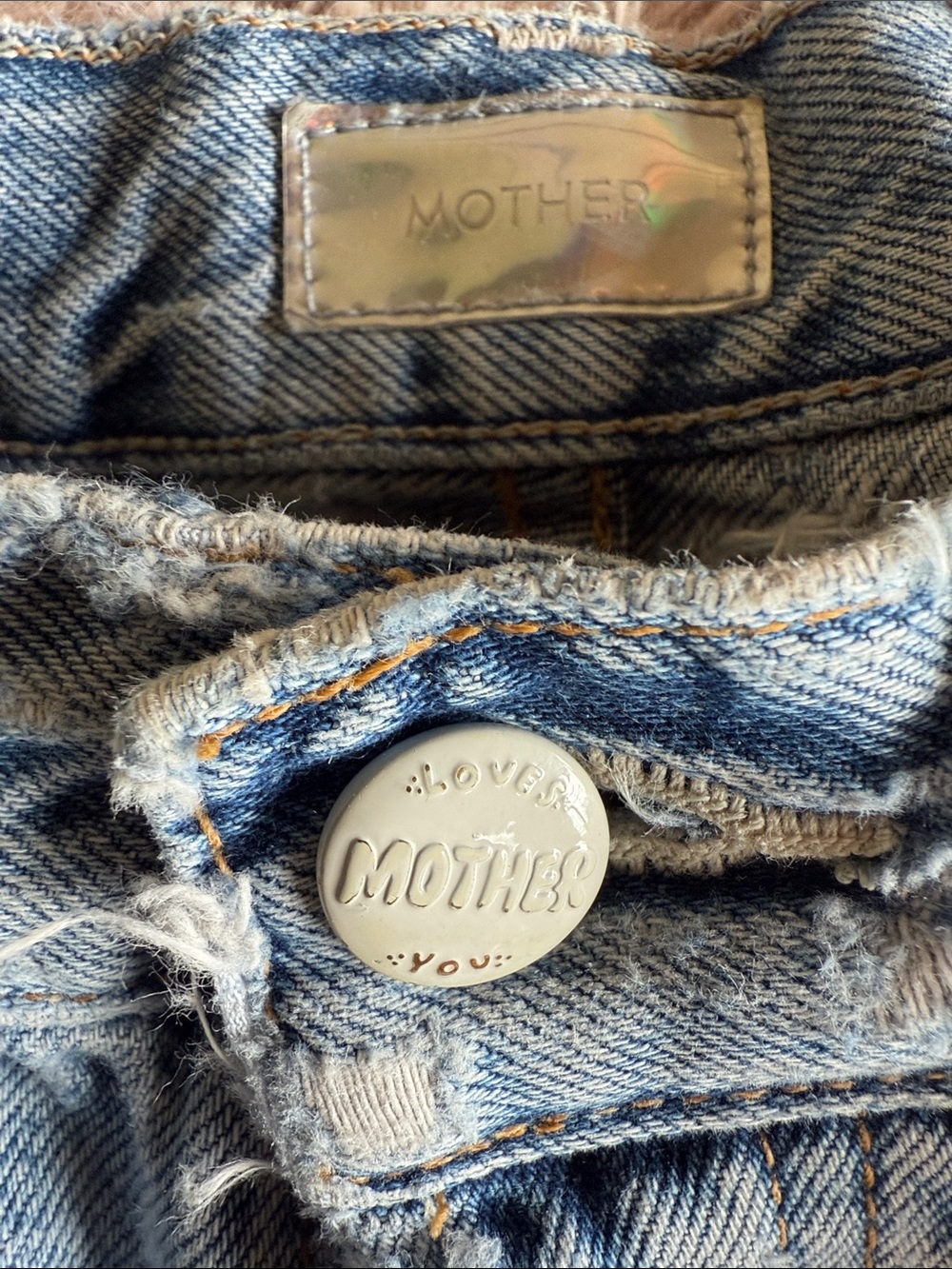 MOTHER Light Blue Distressed Denim Jeans with Branded Button